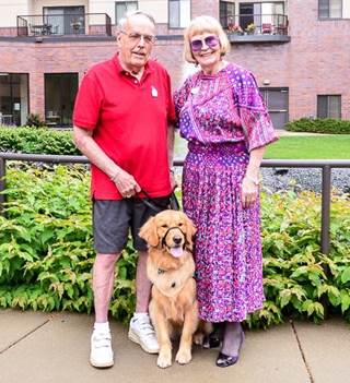 Alta the service dog with Covenant residents Emery and Rubye Erickson. Alta the service dog with Covenant residents Emery and Rubye Erickson.