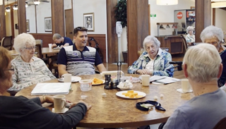 Mike Eidsaune, center, explains to Brookdale Kettering residents what he hopes to accomplish. Mike Eidsaune, center, explains to Brookdale Kettering residents what he hopes to accomplish.
