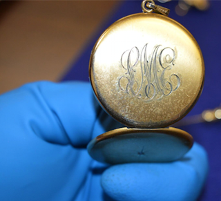 Authorities are trying to find the owners of this piece of jewelry and other valuables. Authorities are trying to find the owners of this piece of jewelry and other valuables.