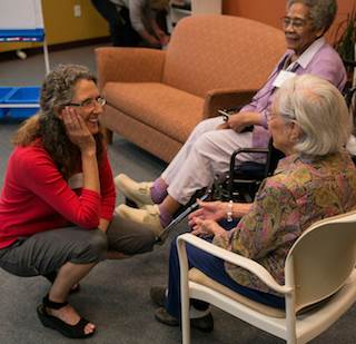 “Ultimately, it's an effort to reduce stigma and ease isolation and loneliness,” Anne Basting, Ph.D., left, said of her TimeSlips method. (Photo: John D. & Catherine T. MacArthur Foundation.) “Ultimately, it's an effort to reduce stigma and ease isolation and loneliness,” Anne Basting, Ph.D., left, said of her TimeSlips method. (Photo: John D. & Catherine T. MacArthur Foundation.)