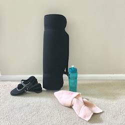 A mat, shoes, towel and water bottle are some of the items used when practicing yoga. A mat, shoes, towel and water bottle are some of the items used when practicing yoga.