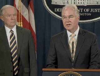 Attorney General Jeff Sessions, left, looks on as HHS Secretary Tom Price, M.D., speaks about the healthcare fraud takedown. Attorney General Jeff Sessions, left, looks on as HHS Secretary Tom Price, M.D., speaks about the healthcare fraud takedown.